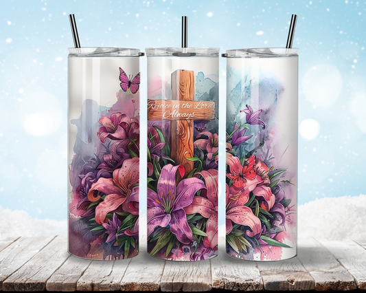 Floral Cross Tumbler featuring vibrant lilies, a wooden cross with 'Rejoice in the Lord Always' text, and a butterfly. Perfect faith-inspired drinkware for hot or cold beverages.