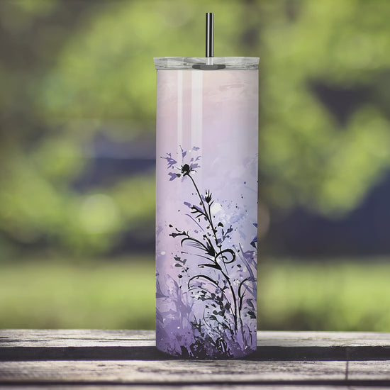 Blooming Grace: Lavender Wildflower Cross Tumbler featuring a serene lavender and wildflower design with a radiant cross centerpiece. Perfect faith-inspired drinkware for home and garden.