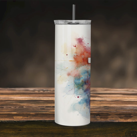 Radiant Faith: Watercolor Cross Tumbler featuring vibrant watercolor splashes and a white cross design. Perfect faith-inspired drinkware for daily use.