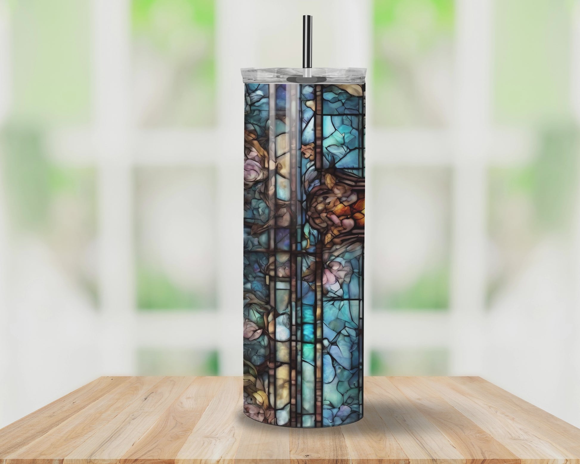 Stained glass cross tumbler with vibrant multicolored design, featuring a faith-inspired pattern. Ideal for keeping drinks hot or cold.